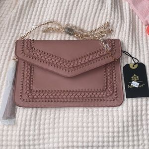 Mauve pink clutch with tassel